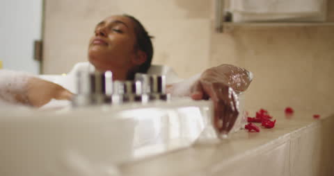 Serene Bathing Ritual with Floating Rose Petals