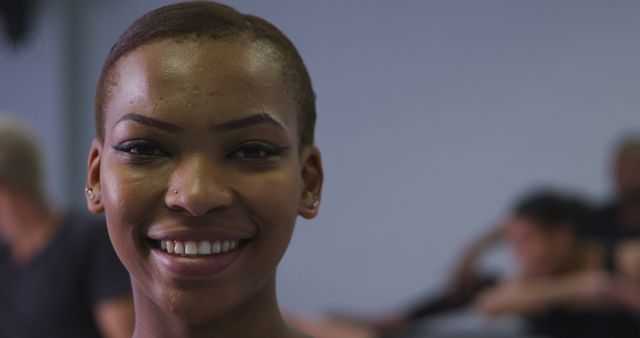 Confident Young African American Woman Smiling in Casual Indoor Setting - Download Free Stock Images Pikwizard.com