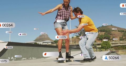 Helping woman balancing on skateboard with partner and social media notifications