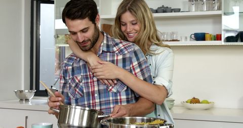 Romantic Couple Cooking Together in Cozy Kitchen - Download Free Stock Images Pikwizard.com