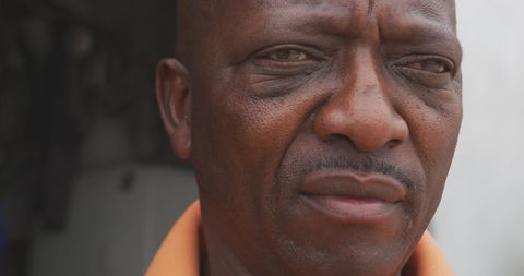 Close-up Portrait of Pensive African Man in Cape Town Township