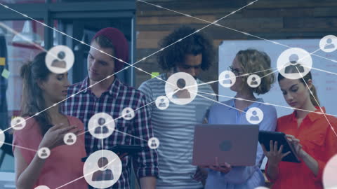 Diverse Colleagues Collaborating on Office Network Project