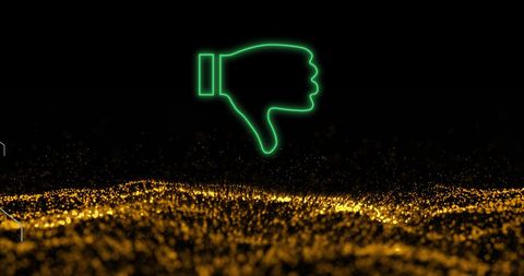 Neon thumbs down over sparkling golden surface background