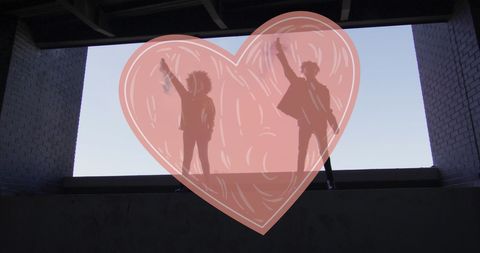 Silhouettes of Empowered Women Raising Fists Against Sky
