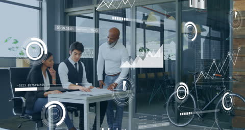 Business Team Analyzing Graphical Data Interface in Modern Office