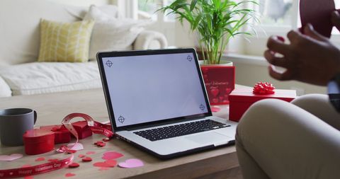 Celebrating Valentine's Day with Remote Laptop Connection - Download Free Stock Images Pikwizard.com