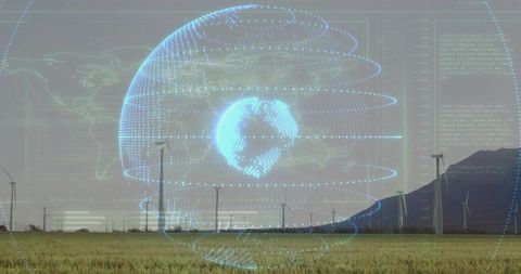 Holographic digital globe overlaying wind farm showing renewable energy network smart grid