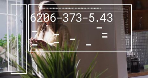 Woman Relaxing by Sunny Kitchen Window with Mug