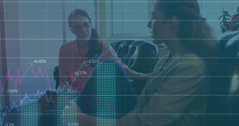 Business Women Analyzing Financial Data with Digital Overlay - Download Free Stock Images Pikwizard.com