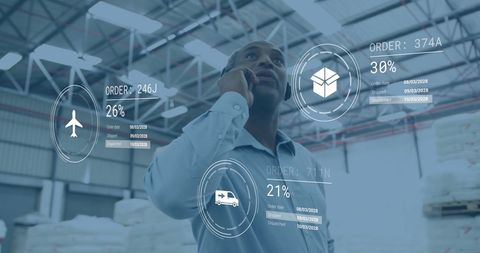 Man Managing Supply Chain Operations in High-Tech Warehouse