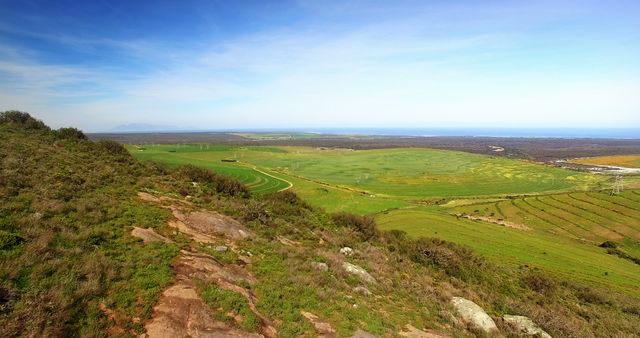 Panoramic View of Green Fields and Countryside Landscape on Sunny Day - Download Free Stock Images Pikwizard.com