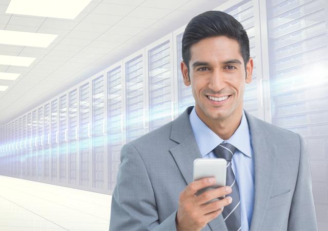 Businessman using mobile phone in server room - Download Free Stock Photos Pikwizard.com