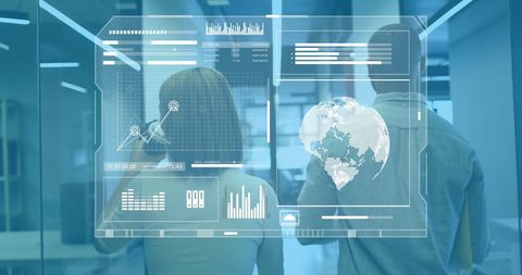 Team Analyzing Financial Data on Futuristic Screen in Office Environment - Download Free Stock Images Pikwizard.com