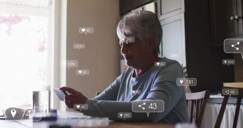 Senior Woman Engaging with Smartphone and Social Media