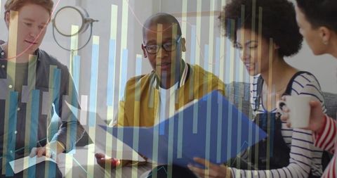 Business Team Collaborating Over Presentation in Modern Office