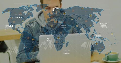 Man working on laptop with global data overlay at cafe, remote analytics and tech workspace
