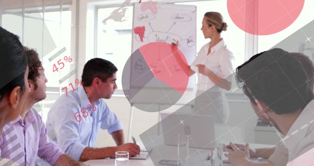 Businesswoman Presenting Strategy to Team in Office - Download Free Stock Images Pikwizard.com