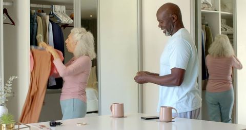 Mature Couple Enjoying Fashion and Lifestyles in Modern Home Setting