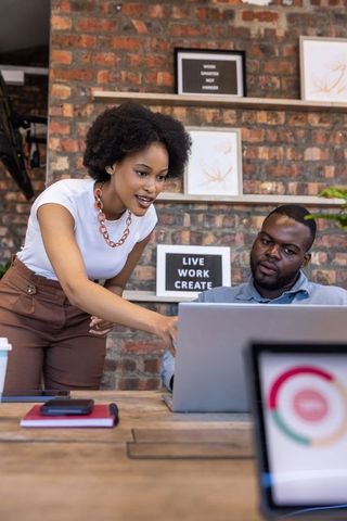 Creative Team Collaborating in Modern Urban Loft Workspace