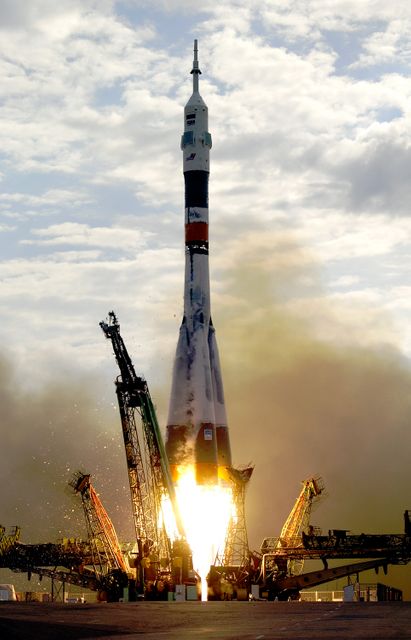 April 26, 2003, Baikonur Cosmodrome, Kazakhstan.   Astronaut Edward T. Lu, NASA ISS science officer and flight engineer for Expedition Seven and Cosmonaut Yuri I. Malenchenko, Commander were launched onboard a Soyuz rocket at 9:53aam from Baikonur, Kazakhstan.  Photo Credit: "NASA/Scott Andrews"