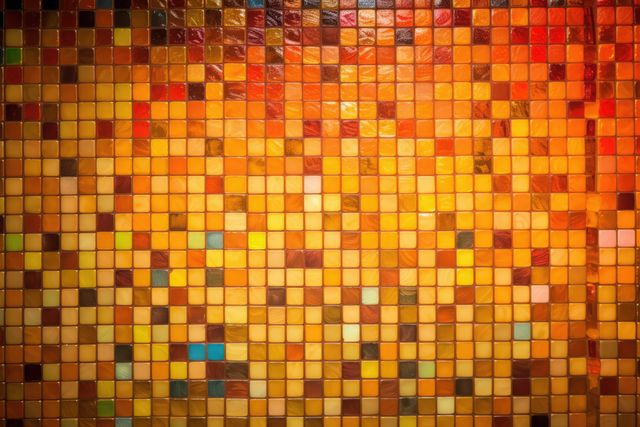 This vibrant mosaic tile wall with warm tones creates a stunning abstract pattern using shades of orange, yellow, and hints of brown and blue. Ideal for backgrounds, graphic design projects, or interior decoration inspiration. It brings an artistic and lively energy to any space, making it perfect for advertising, website banners, or magazine layouts.