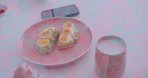 Stylish sushi presentation beside smartphone on pink plate