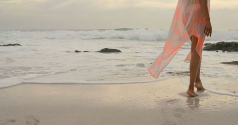Peaceful Beach Stroll at Sunrise Creates Tranquility