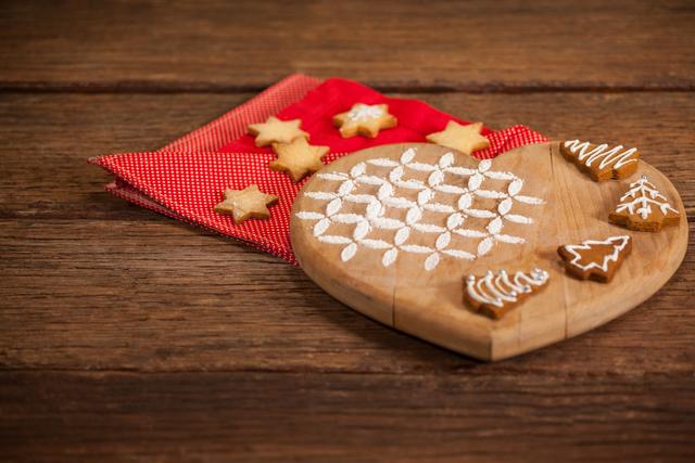 Ginger bread and cookies decorated on wooden table during christmas time