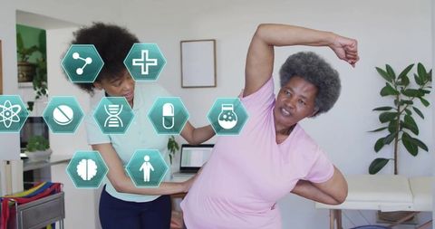 Physiotherapist guides client in stretching with healthcare technology icons