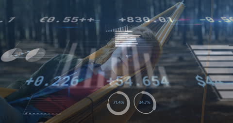 Digital Data Overlay on Relaxing Woman in Hammock