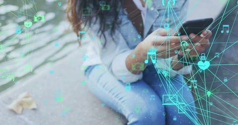 Connected world: woman engaging with digital network on smartphone