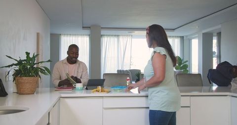 Family Breakfast Preparation in Modern Home Kitchen