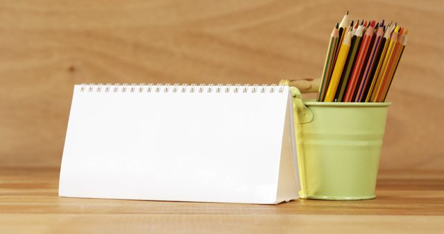 Blank Desk Calendar with Colored Pencils in Green Tin - Download Free Stock Images Pikwizard.com