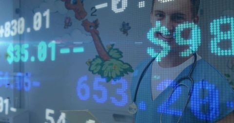 Pediatric Doctor Reviewing Digital Health Data with Financial Ticker Overlay in Clinic
