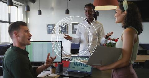 Collaborating Professionals Analyzing Data in Modern Office