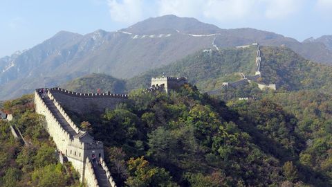 Great Wall of China Winding Through Mountains on Clear Day