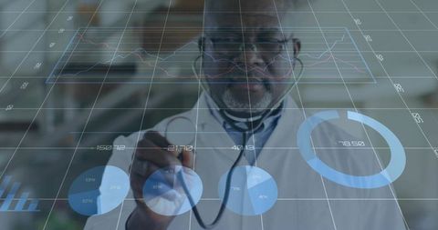 Senior doctor pointing at holographic medical data visualization for diagnostic insights