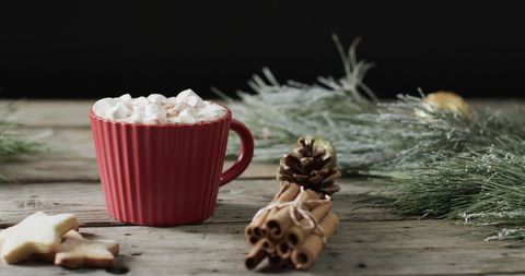 Cozy Holiday Scene with Hot Chocolate and Spice Decorations - Download Free Stock Images Pikwizard.com