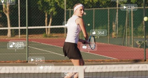 Focused Tennis Player Engaging in Outdoor Lawn Match