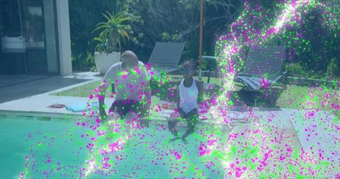 Grandparents and granddaughter dipping feet at backyard pool, summer family bonding and relaxation