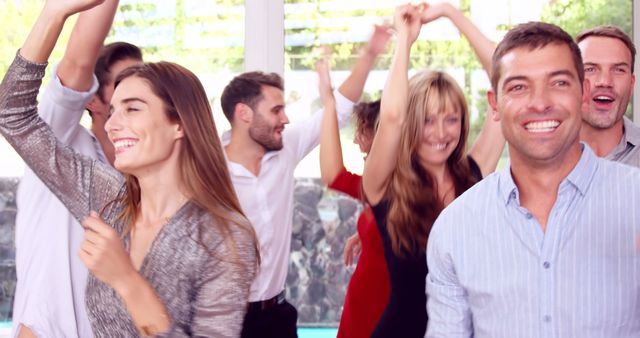 Joyful Friends Dancing at Energetic Party Indoors - Download Free Stock Images Pikwizard.com