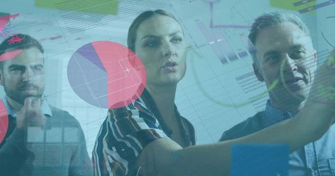 Business Team Engaging with Interactive Data Display for Analysis