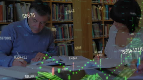 Students Analyzing Data and Graphs in Library