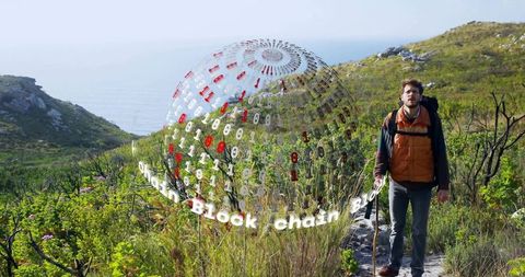 Hiker exploring coastal trail with holographic blockchain globe and binary code overlay