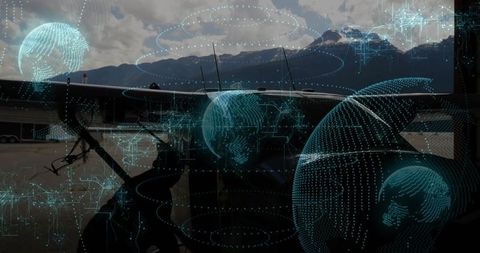 Technician performing high-tech maintenance on twin engine plane