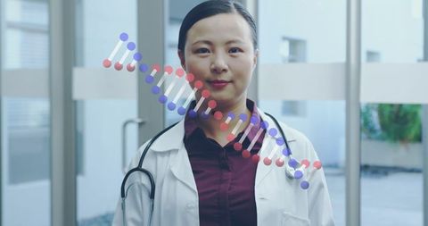 Asian female doctor with digital dna strand overlay