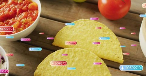Overlapping crisp corn taco shells on rustic wood with salsa, slaw, floating digital tags
