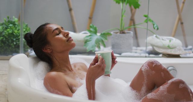 Relaxed Woman Enjoying Hot Bubble Bath at Home - Download Free Stock Images Pikwizard.com