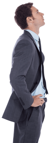 transparent businessman gazing up with hands on hips in suit - Download Free Stock Videos Pikwizard.com