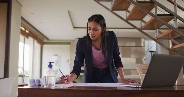 Focused Professional Woman Working in Modern Home Office - Download Free Stock Images Pikwizard.com